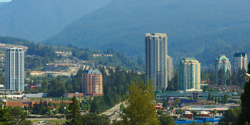The Coquitlam skyline at first light, with residential towers along the ridge.